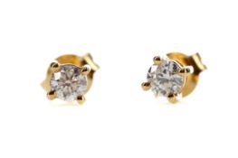 A PAIR OF DIAMOND STUD EARRINGS