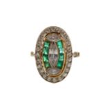 AN EMERALD AND DIAMOND RING