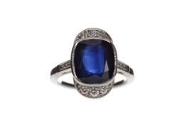 A SAPPHIRE AND DIAMOND RING