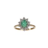 A CERTIFICATED EMERALD AND DIAMOND CLUSTER RING