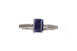 A SAPPHIRE AND DIAMOND RING