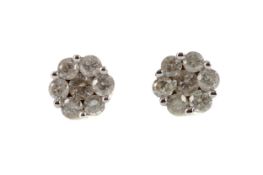 A PAIR OF DIAMOND CLUSTER EARRINGS