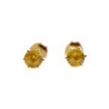 A PAIR OF TREATED YELLOW SAPPHIRE STUD EARRINGS
