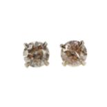 A PAIR OF DIAMOND STUD EARRINGS