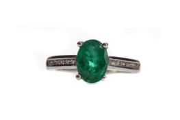 AN EMERALD AND DIAMOND RING