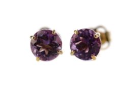 A PAIR OF AMETHYST STUD EARRINGS