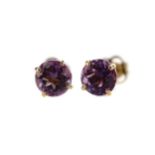 A PAIR OF AMETHYST STUD EARRINGS