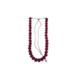 A CARVED RUBY NECKLACE