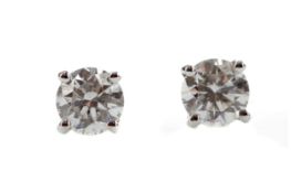 A PAIR OF CERTIFICATED DIAMOND STUD EARRINGS