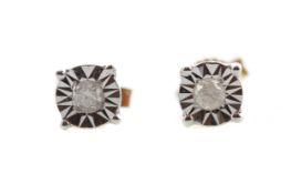 A PAIR OF ILLUSION SET DIAMOND EARRINGS