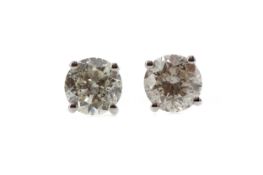 A PAIR OF DIAMOND STUD EARRINGS