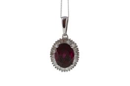 A GARNET AND DIAMOND PENDANT