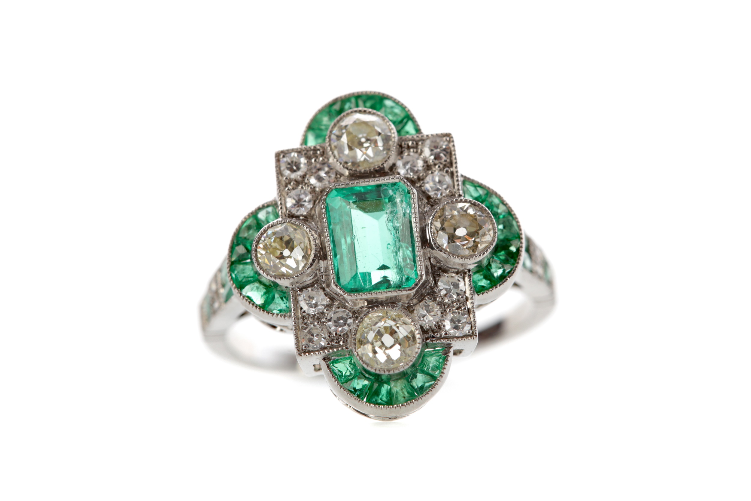 AN EMERALD AND DIAMOND RING