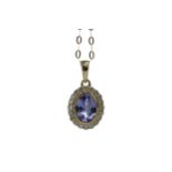 A TANZANITE AND DIAMOND PENDANT