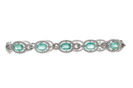 AN EMERALD AND DIAMOND BRACELET