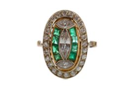 AN EMERALD AND DIAMOND RING