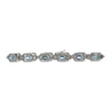 A TOPAZ AND DIAMOND BRACELET