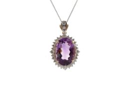 AN AMETHYST AND DIAMOND PENDANT