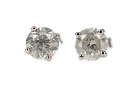 A PAIR OF DIAMOND STUD EARRINGS