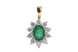 AN EMERALD AND DIAMOND PENDANT