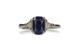 A SAPPHIRE AND DIAMOND RING