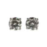 A PAIR OF DIAMOND STUD EARRINGS