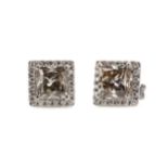 A PAIR OF DIAMOND STUD EARRINGS