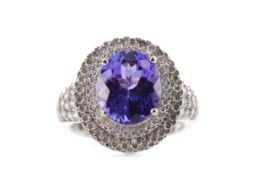 A TANZANITE AND DIAMOND RING