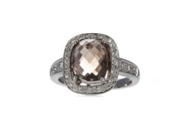 A SMOKY QUARTZ AND DIAMOND RING