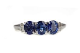 A SAPPHIRE AND DIAMOND RING