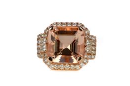 A MORGANITE AND DIAMOND RING