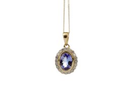 A TANZANITE AND DIAMOND PENDANT