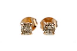 A PAIR OF ROSE GOLD DIAMOND STUD EARRINGS