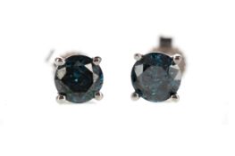 A PAIR OF TREATED BLUE DIAMOND STUD EARRINGS