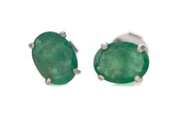 A PAIR OF EMERALD STUD EARRINGS