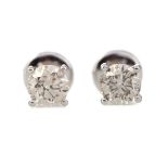 A PAIR OF DIAMOND STUD EARRINGS