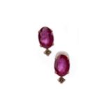 A PAIR OF TREATED RUBY AND DIAMOND EARRINGS