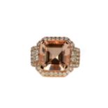 A MORGANITE AND DIAMOND RING