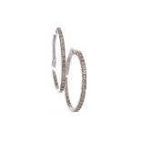 A PAIR OF DIAMOND HOOP EARRINGS