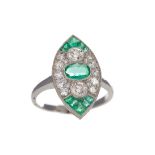 AN EMERALD AND DIAMOND RING