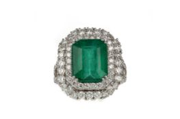 AN EMERALD AND DIAMOND RING