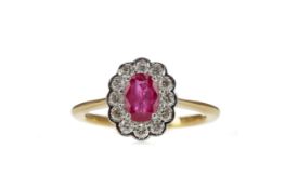 A RUBY AND DIAMOND CLUSTER RING