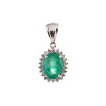 AN EMERALD AND DIAMOND PENDANT