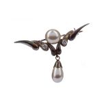 A FAUX PEARL AND GEM SET BROOCH