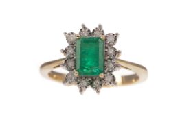 AN EMERALD AND DIAMOND RING