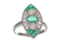 AN EMERALD AND DIAMOND RING