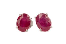 A PAIR OF TREATED RUBY EARRINGS