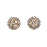 A PAIR OF CERTIFICATED YELLOW DIAMOND STUD EARRINGS