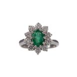 A CERTIFICATED EMERALD AND DIAMOND RING