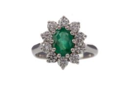 A CERTIFICATED EMERALD AND DIAMOND RING